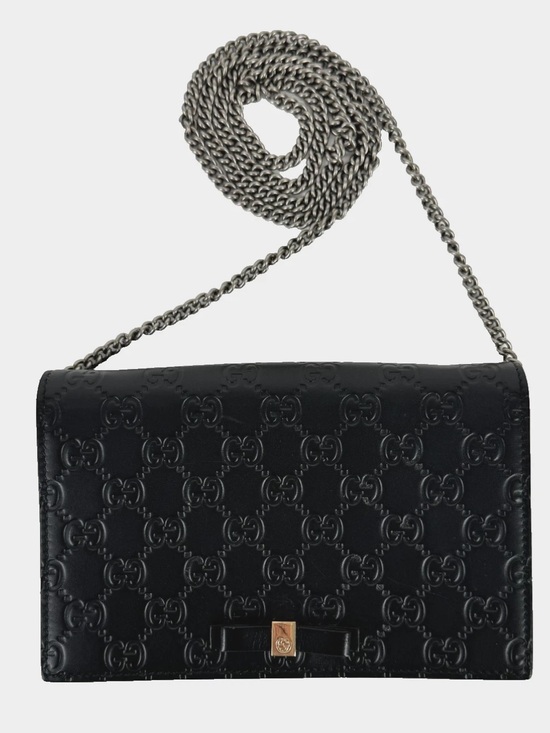 Gucci Handbags - Authentic Gucci Black Embossed Mini Guccissima Bow Signature Bag